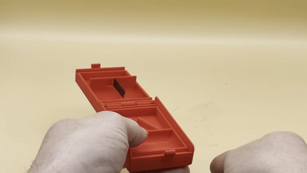 Pill Box with Integrated Cutter-Scraper Blade