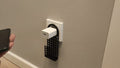 Holder for charging mobile phone for the socket.