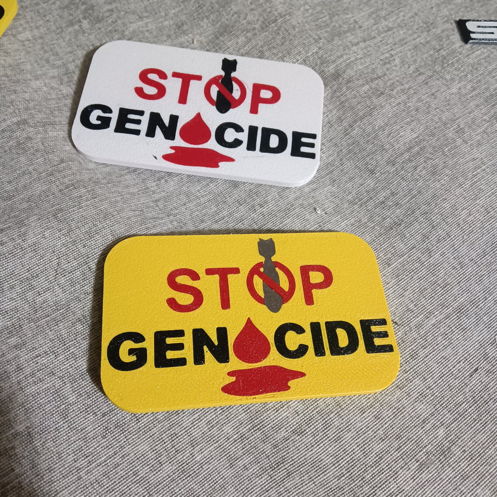 STOP GENOCIDE badge