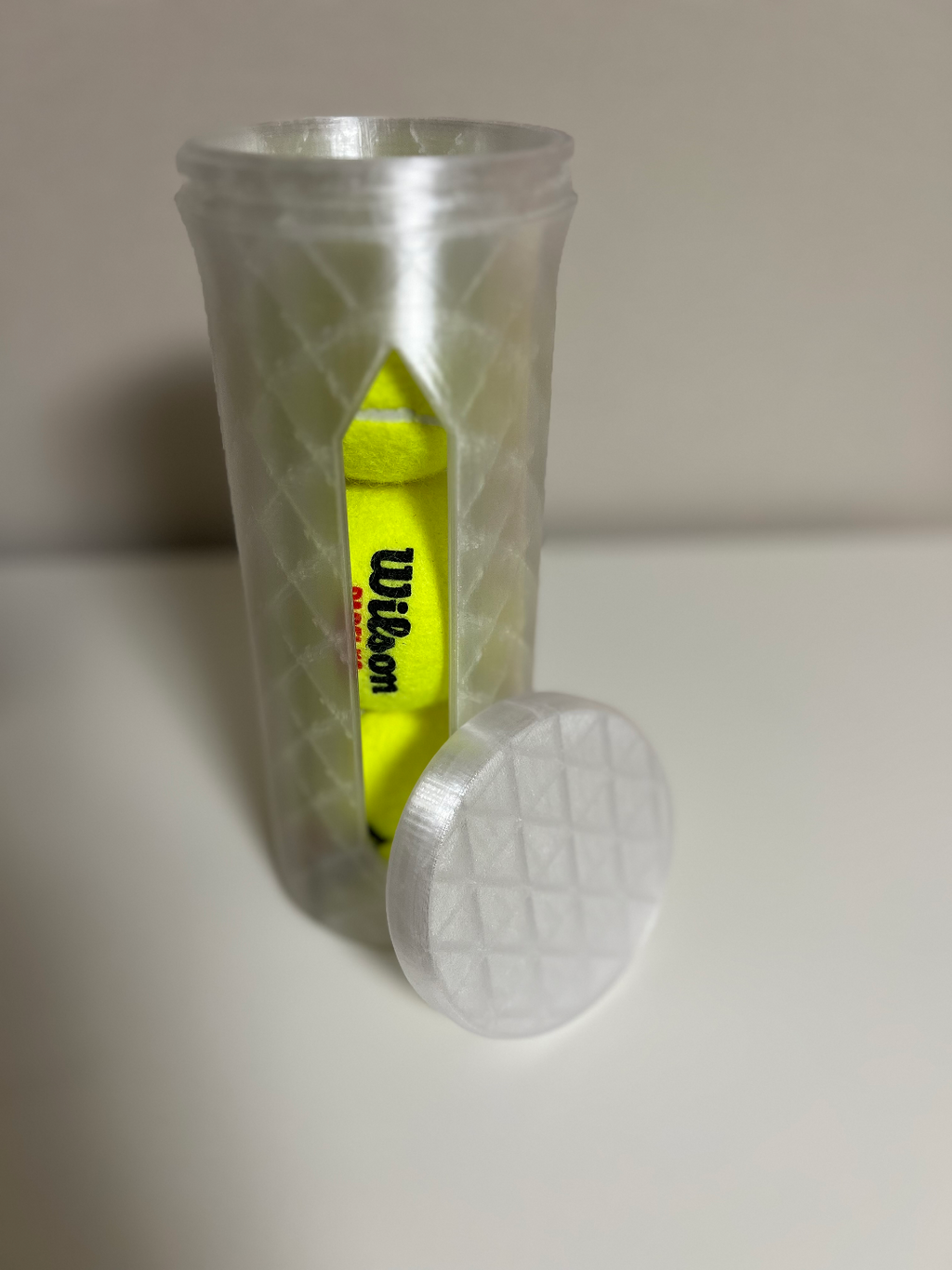 Storage box for tennis balls
