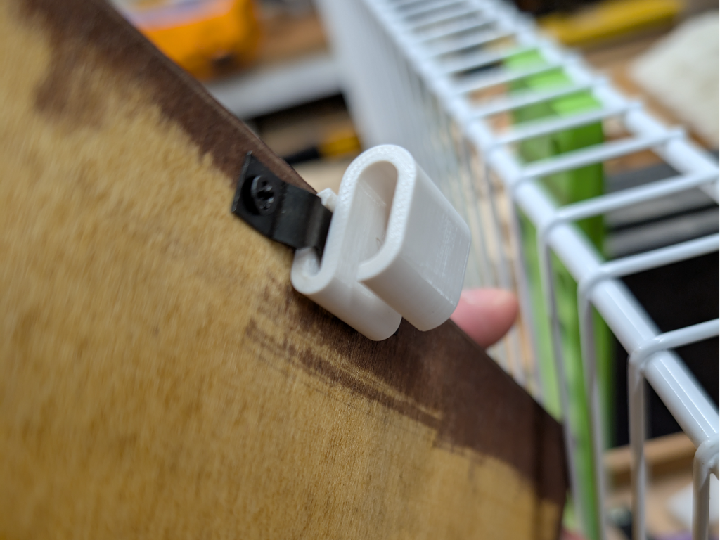 Hook for attaching frames to grid wall