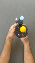 Handheld model of Sun Earth and Moon