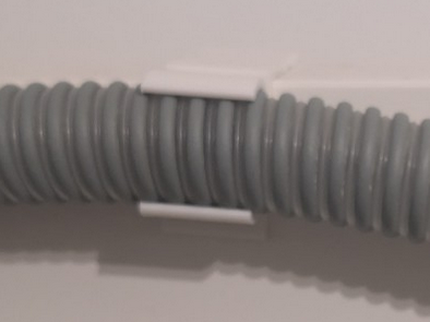 Parametric cpap tube holder for bed headboards