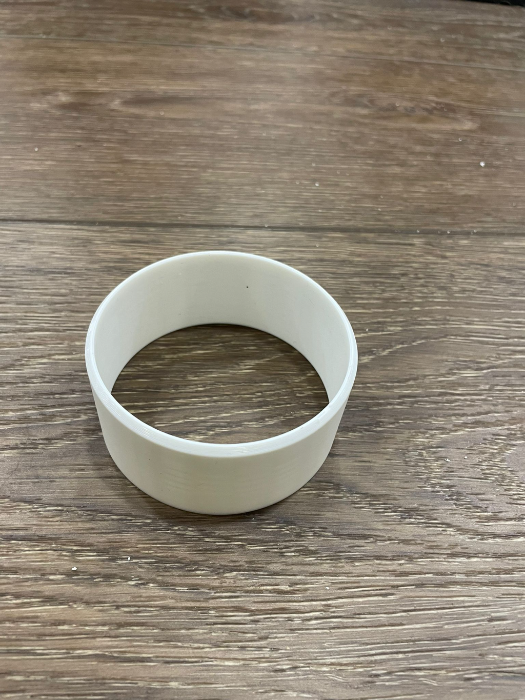 Adapter to connect 3" fitting to 2 inch fitting.