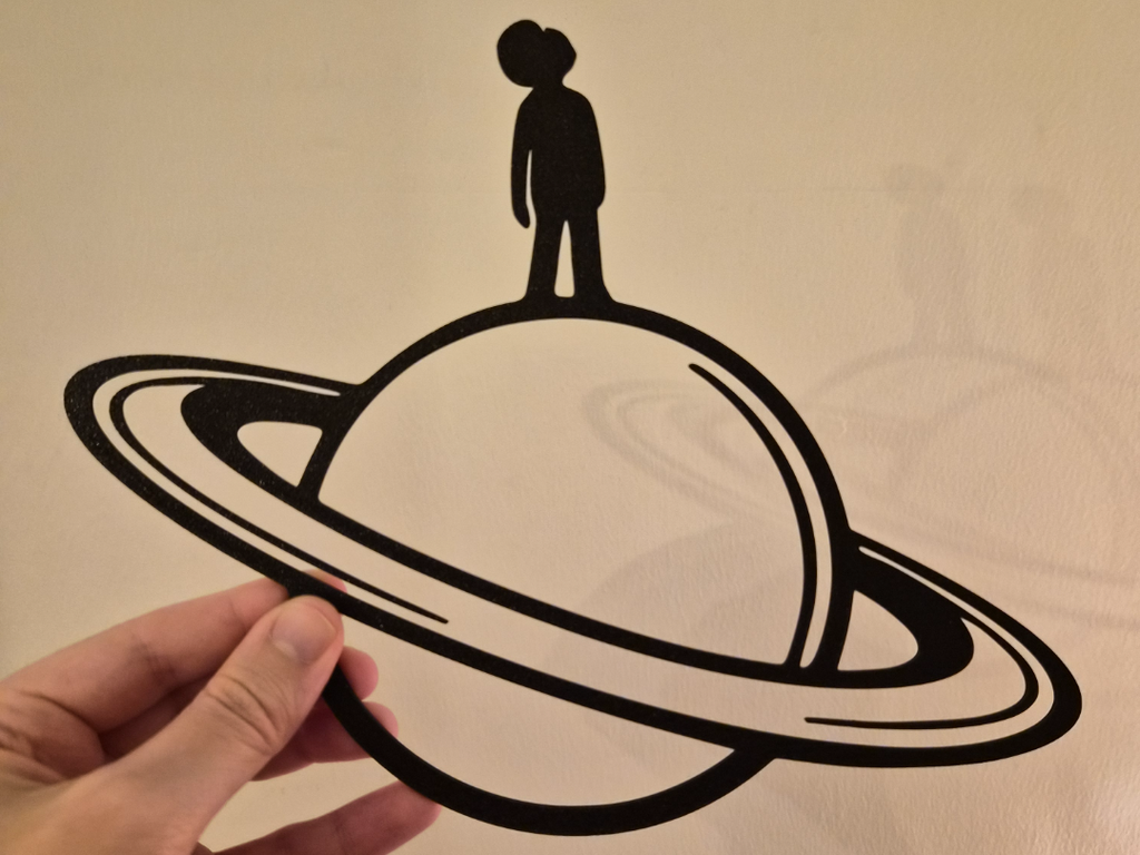 Man on Saturn Wall Art