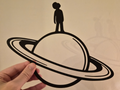 Man on Saturn Wall Art