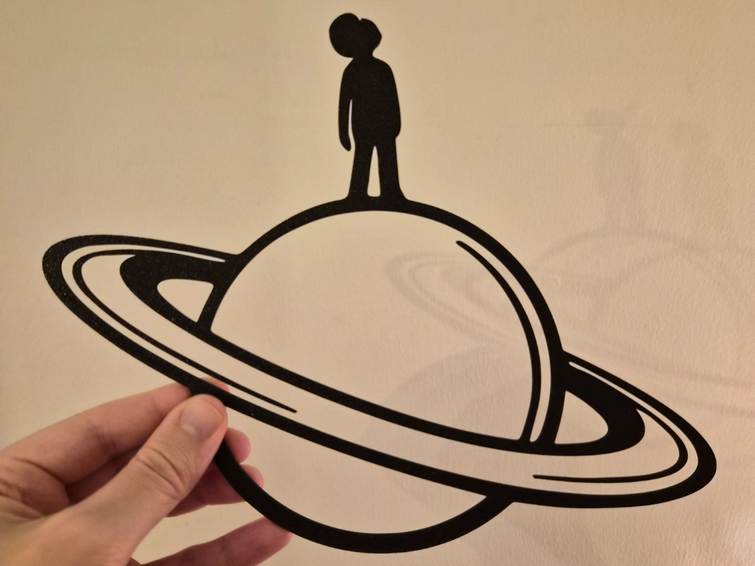 Man on Saturn Wall Art