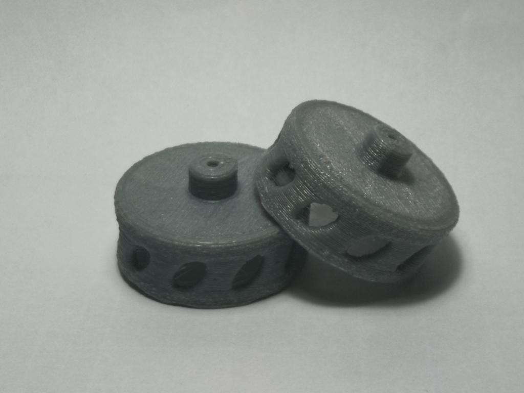 3D printed flywheels for blasters