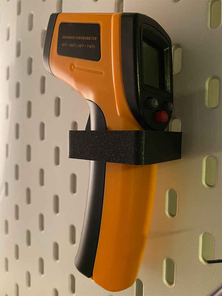 Infrared thermometer hanger for IKEA SKADIS