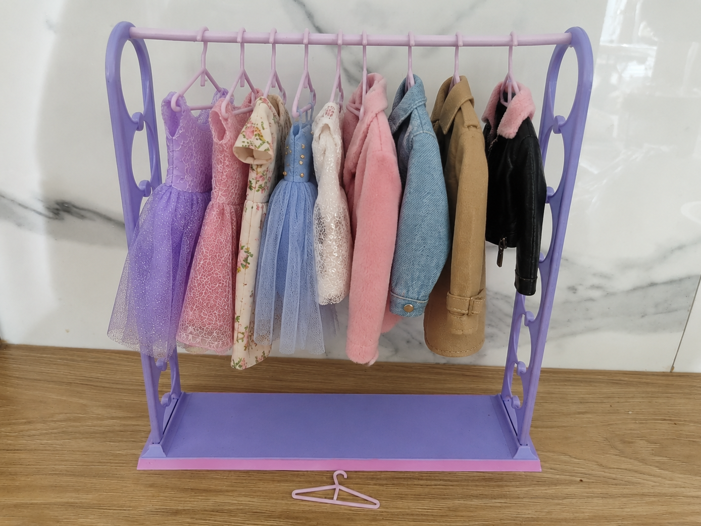 Doll clothes rack with hangers