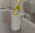 Toothbrush holder shower