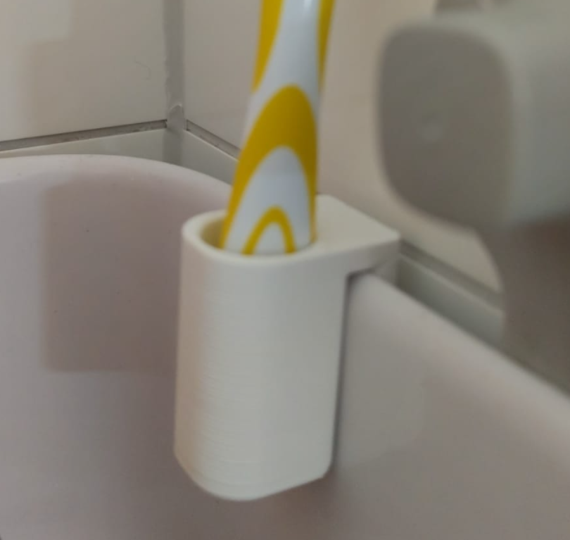 Toothbrush holder shower
