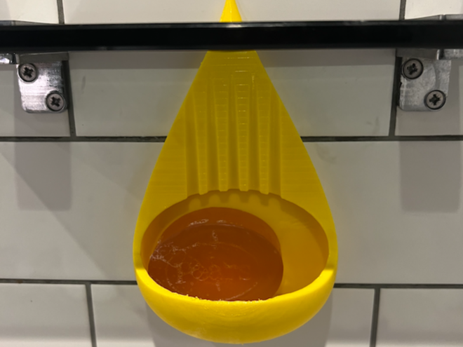 Water drop design for soap holder