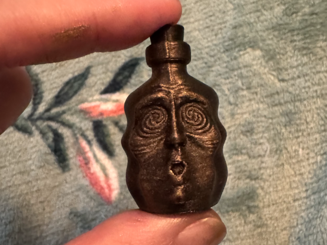 Wavy Bottle with Face