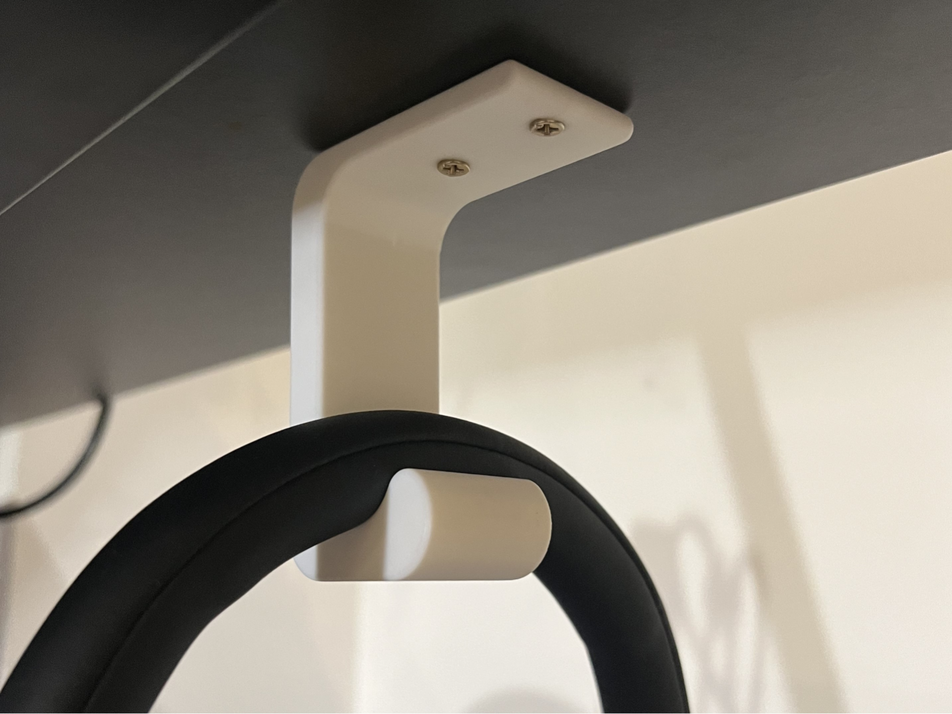 Under-desk headphone holder