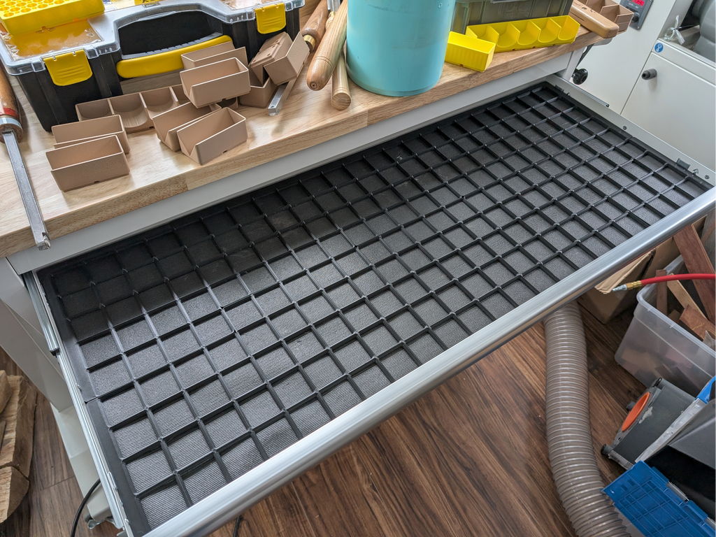 Husky 52" height-adjustable bench Gridfinity base