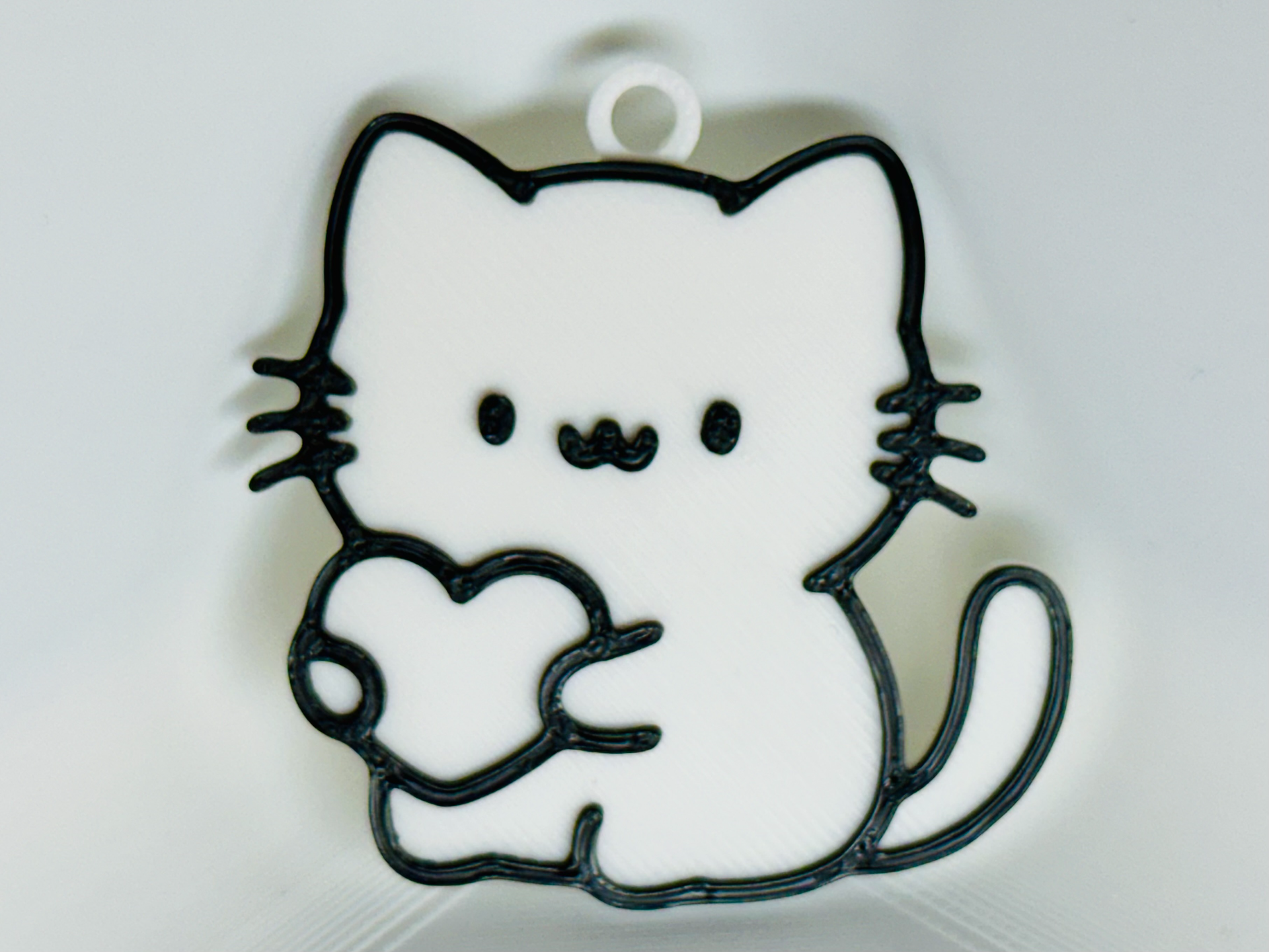 Cat Holding a Heart Keychain