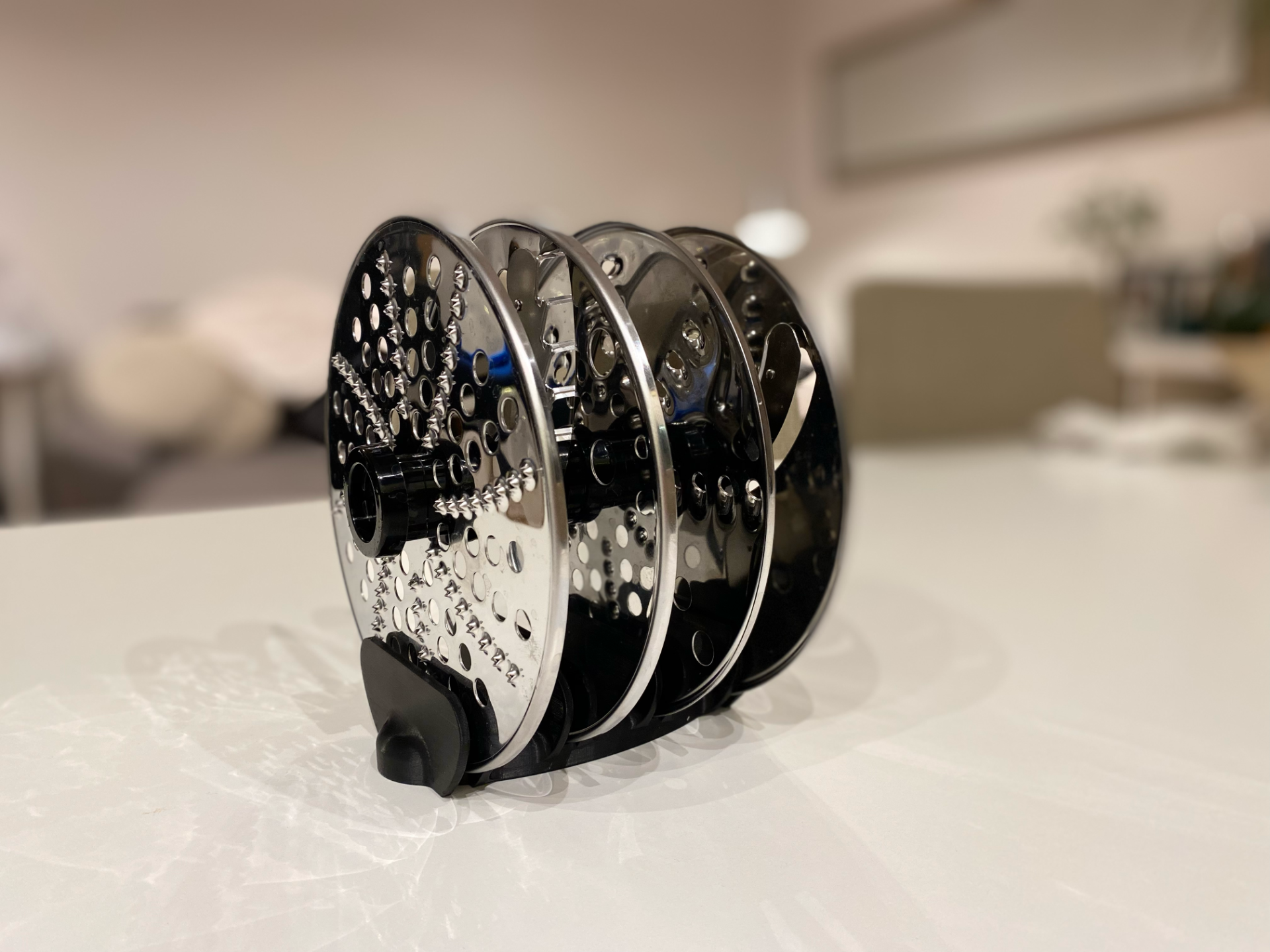Attachment holder for a kitchen food processor