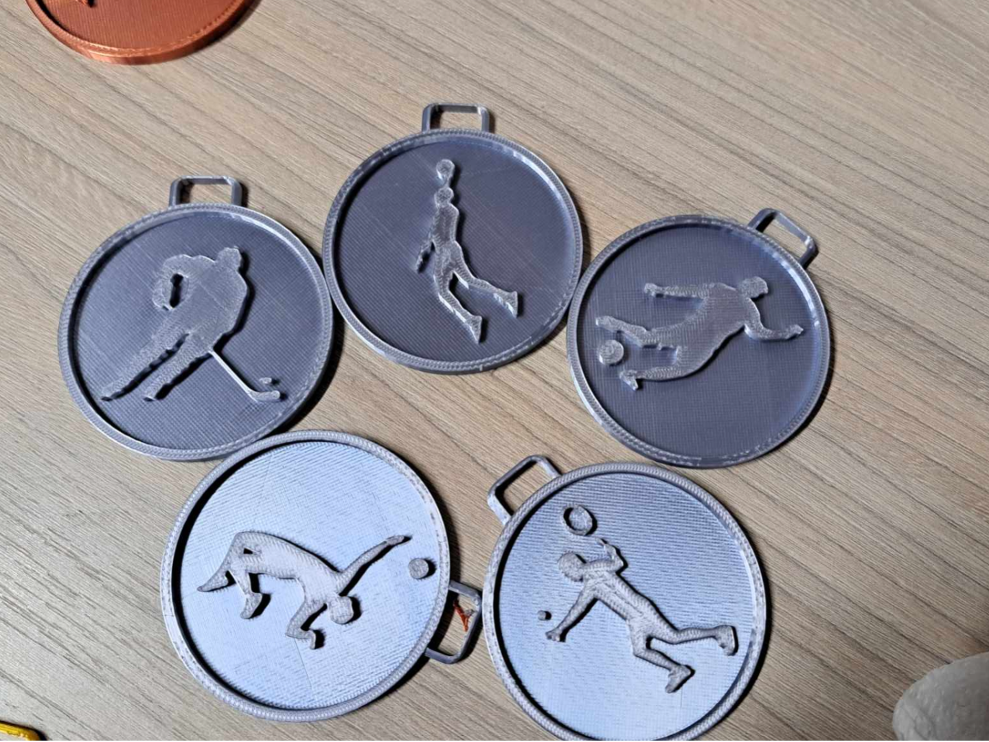 Medals set - football hockey volleyball basketball