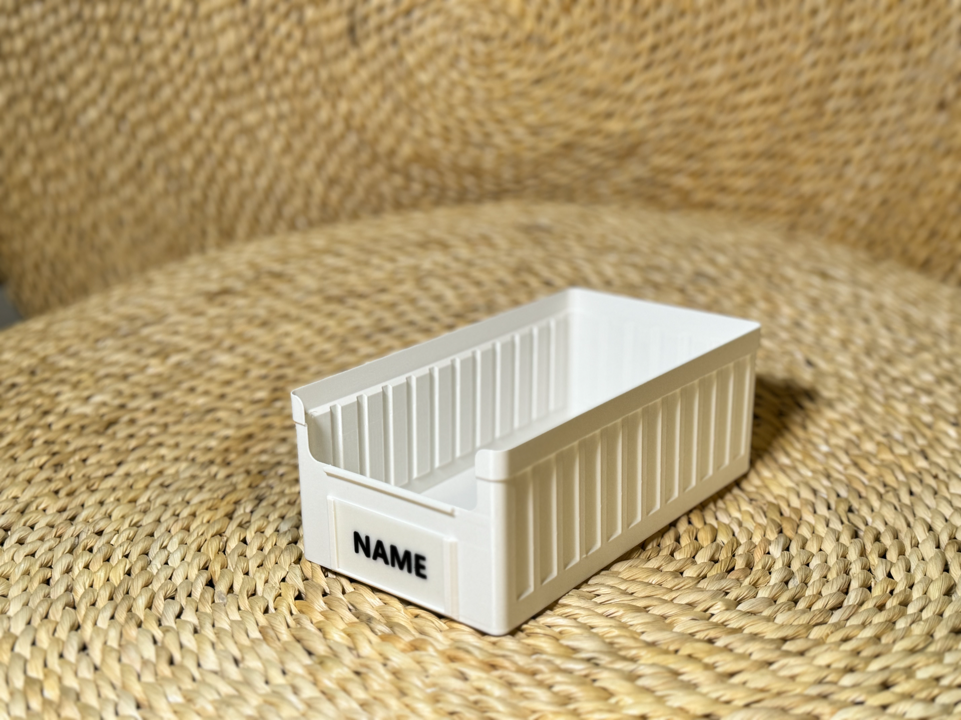 Stackable box with nameplate slot