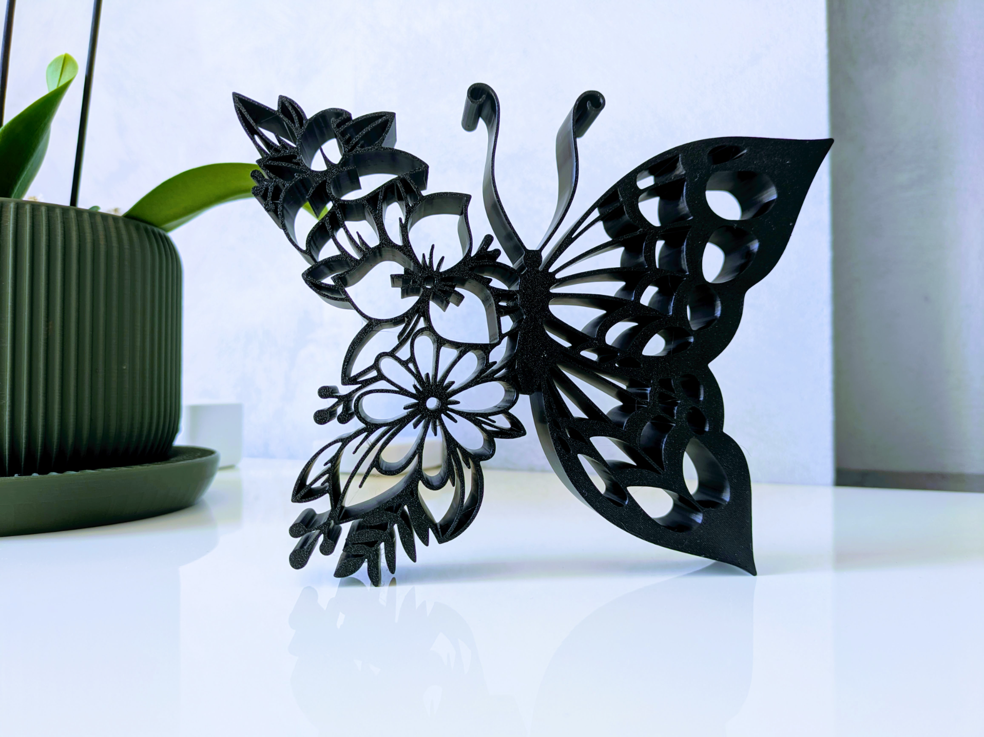 Floral butterfly ornament