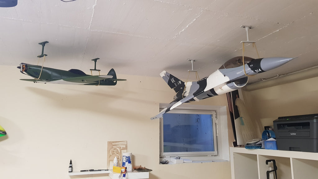 Rc plane ceiling hanger