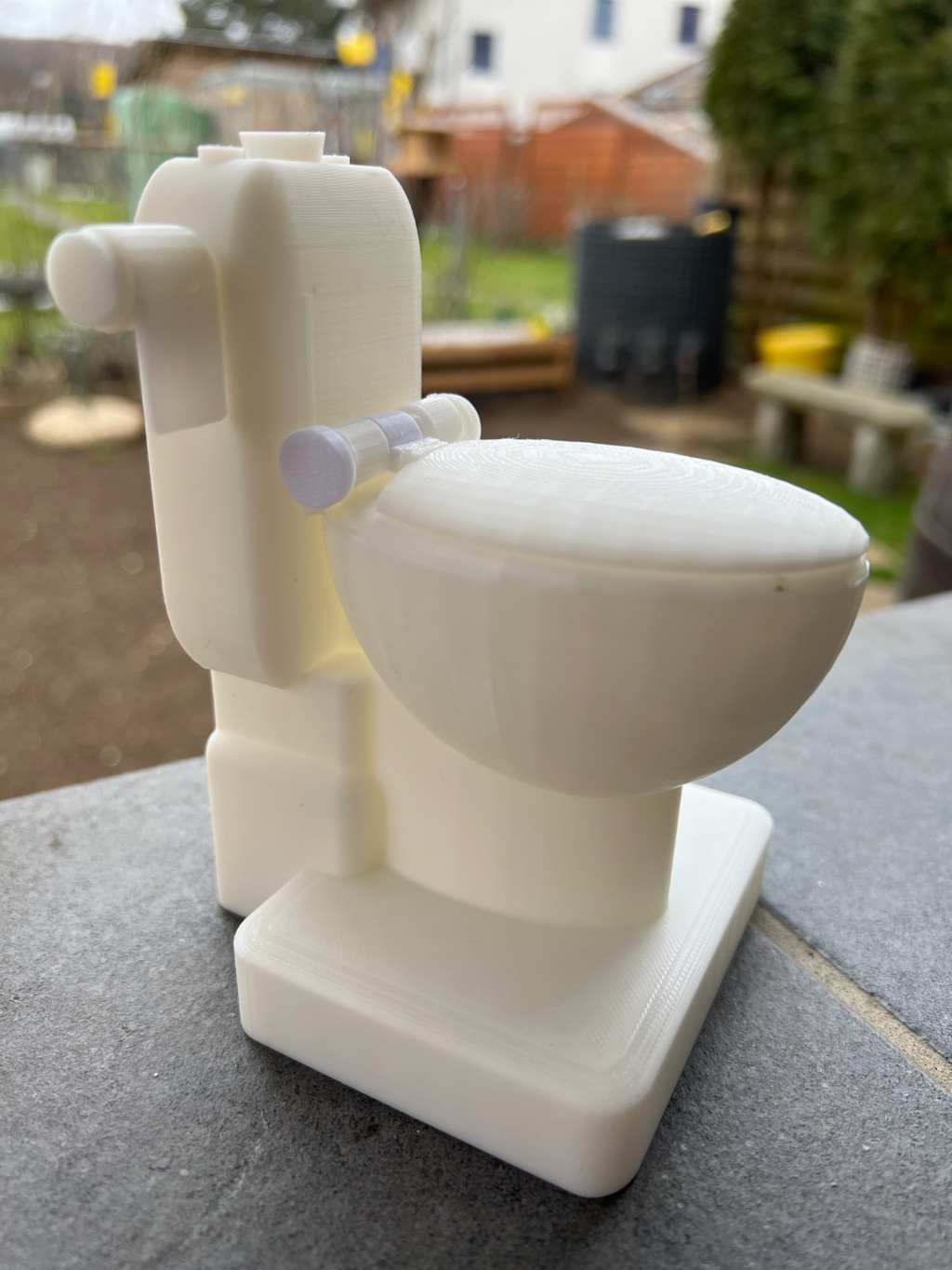 Flushable Toilet Kit - Spits water out the back.