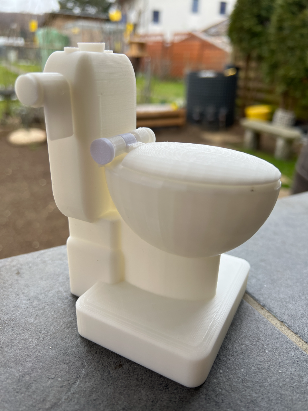 Flushable Toilet Kit - Spits water out the back.