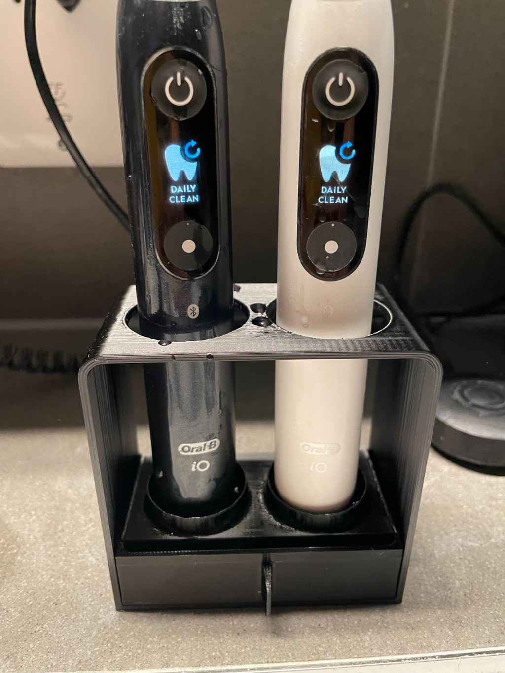 Electric toothbrush stand with drip tray