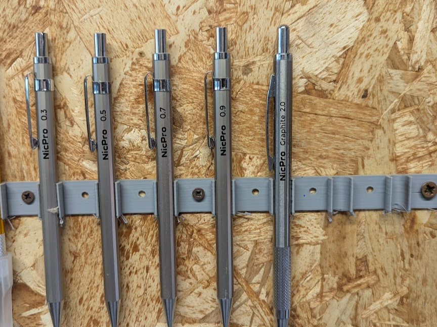 Wall-Mounted Pen and Tool Holder