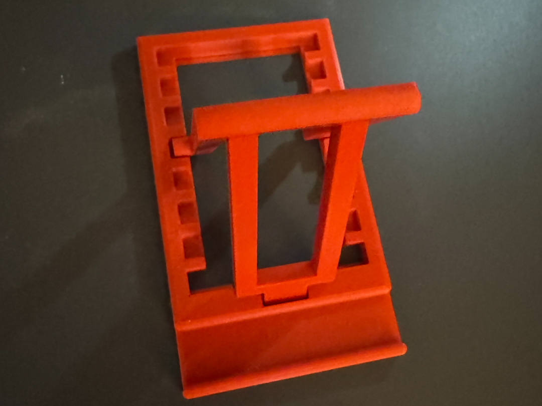 Adjustable folding phone stand (print in place)