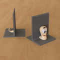 The Friendly Bookworm: a playful bookend with a "Worms" creature