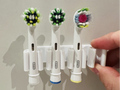 Toothbrush head holder for OralB