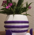 Cute sitting pot.