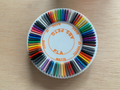Spinning filament swatch display with names