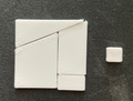 Rearranging tile optical puzzle