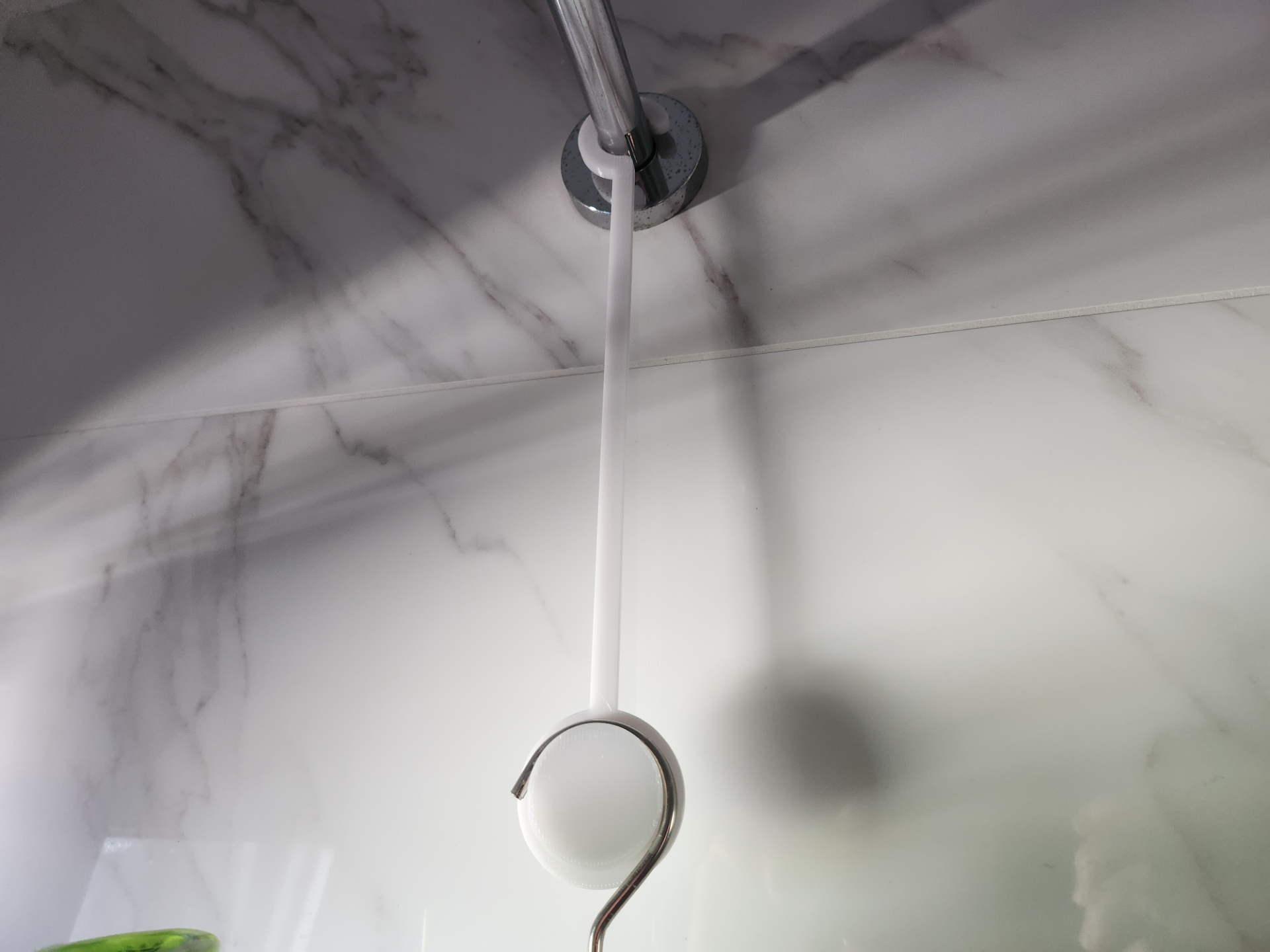 Shower caddy hanger extension
