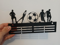 Medal holder for a football player