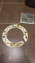 Drainage grate holder replacement