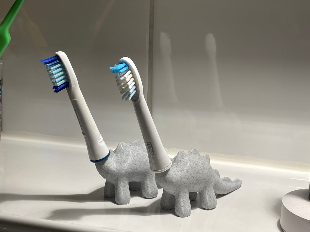 Cute Stylized Dinosaur Toothbrush Holder