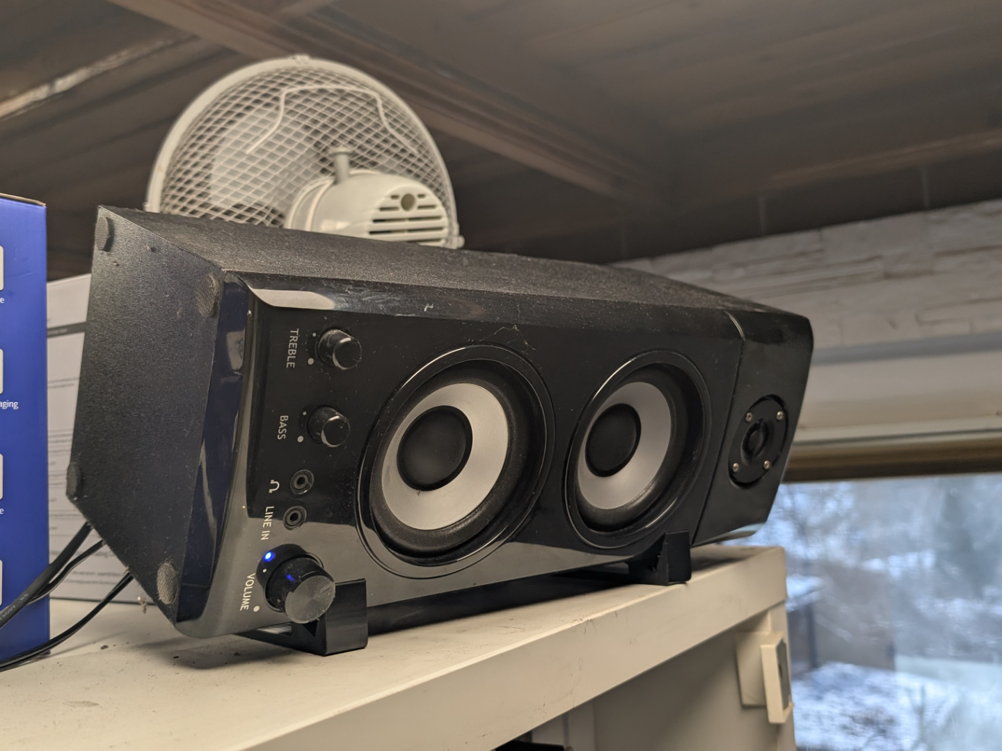 Speaker angle stand, high shelf