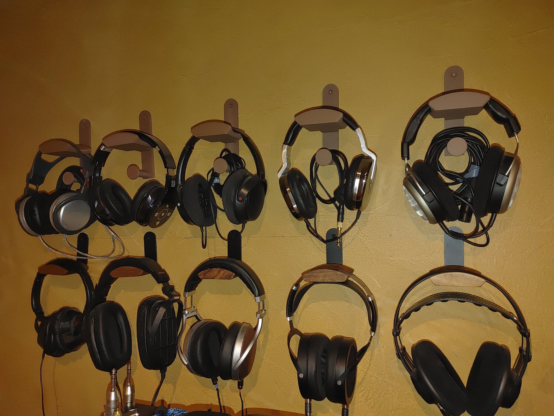 Wall mountable headphone hanger with cable management