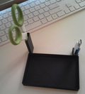 Desk organizer for USB, scissors, and camera.