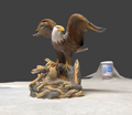 Eagle Feeding Chicks in nest