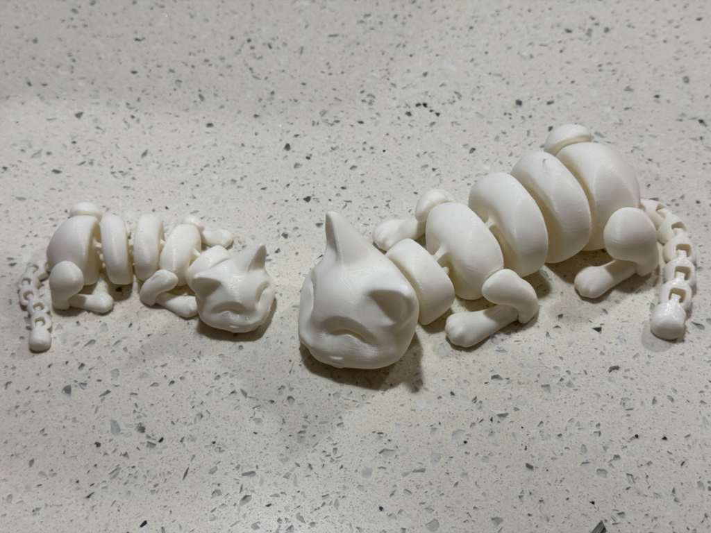 Sleepy cat and sleepy kitten: articulated cats