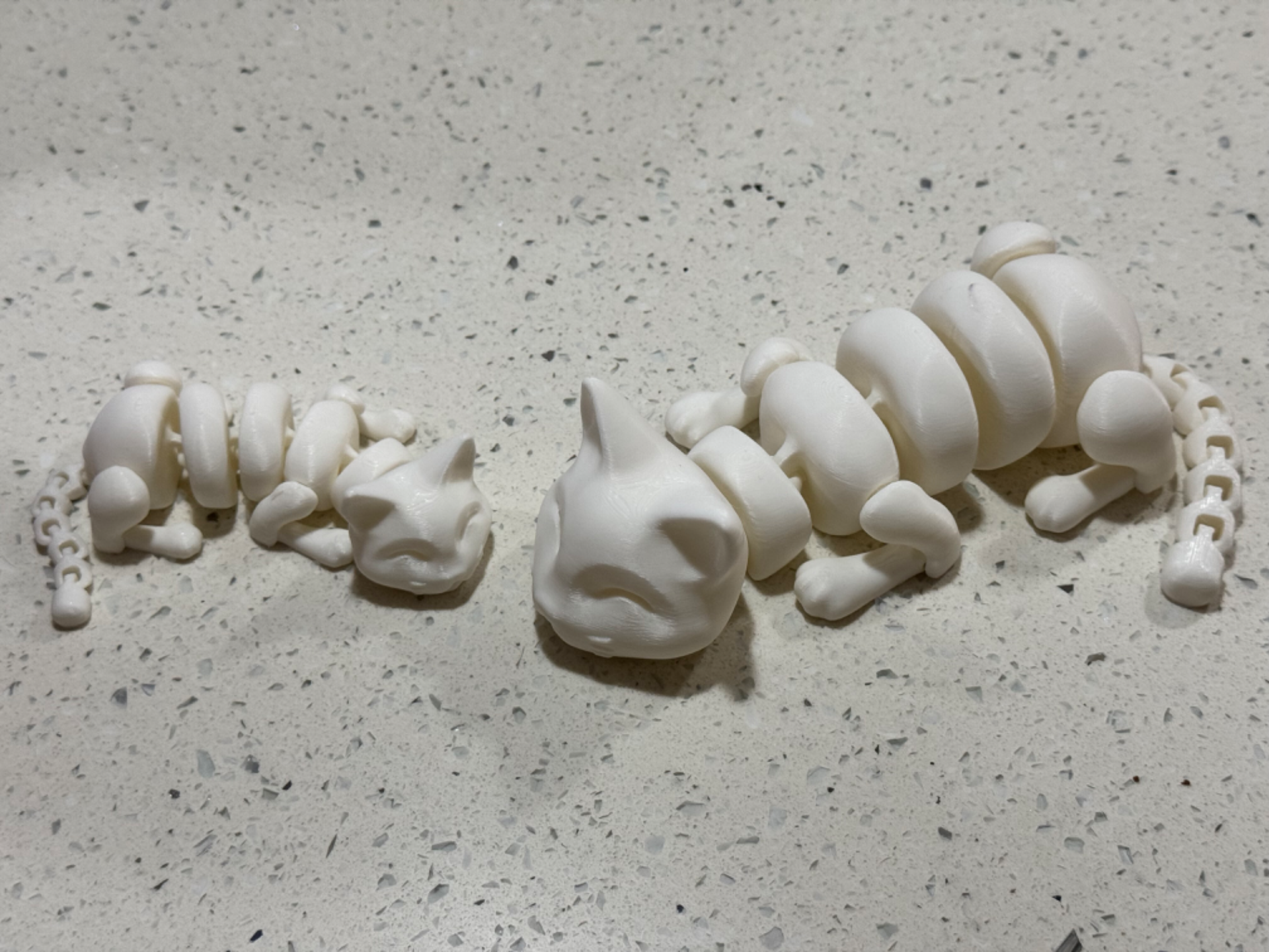 Sleepy cat and sleepy kitten: articulated cats
