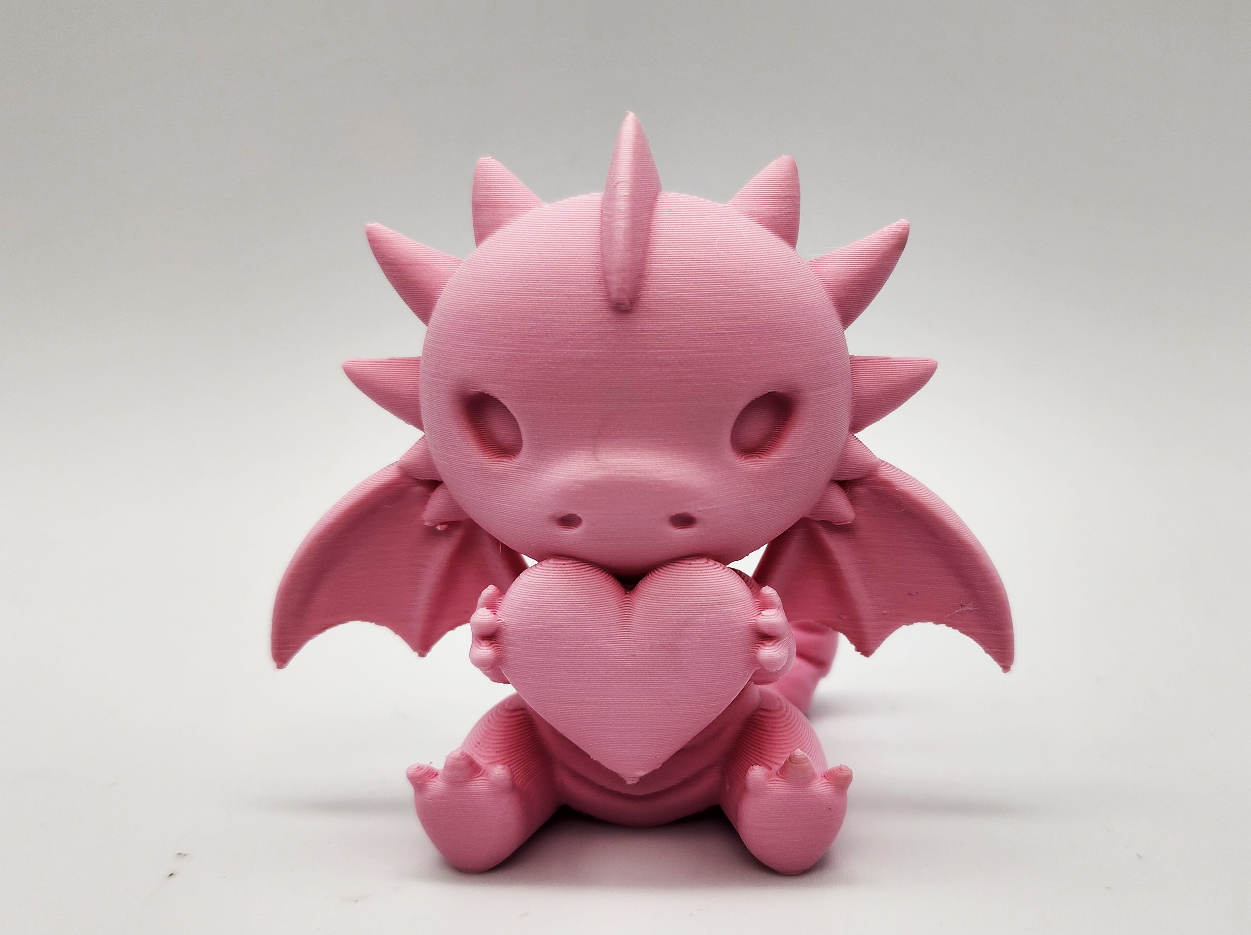 Cute Sitting Dragon with Heart Figure