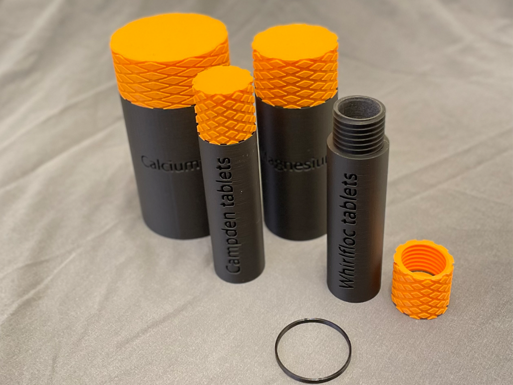 Screw top containers with TPU seal, embossed label