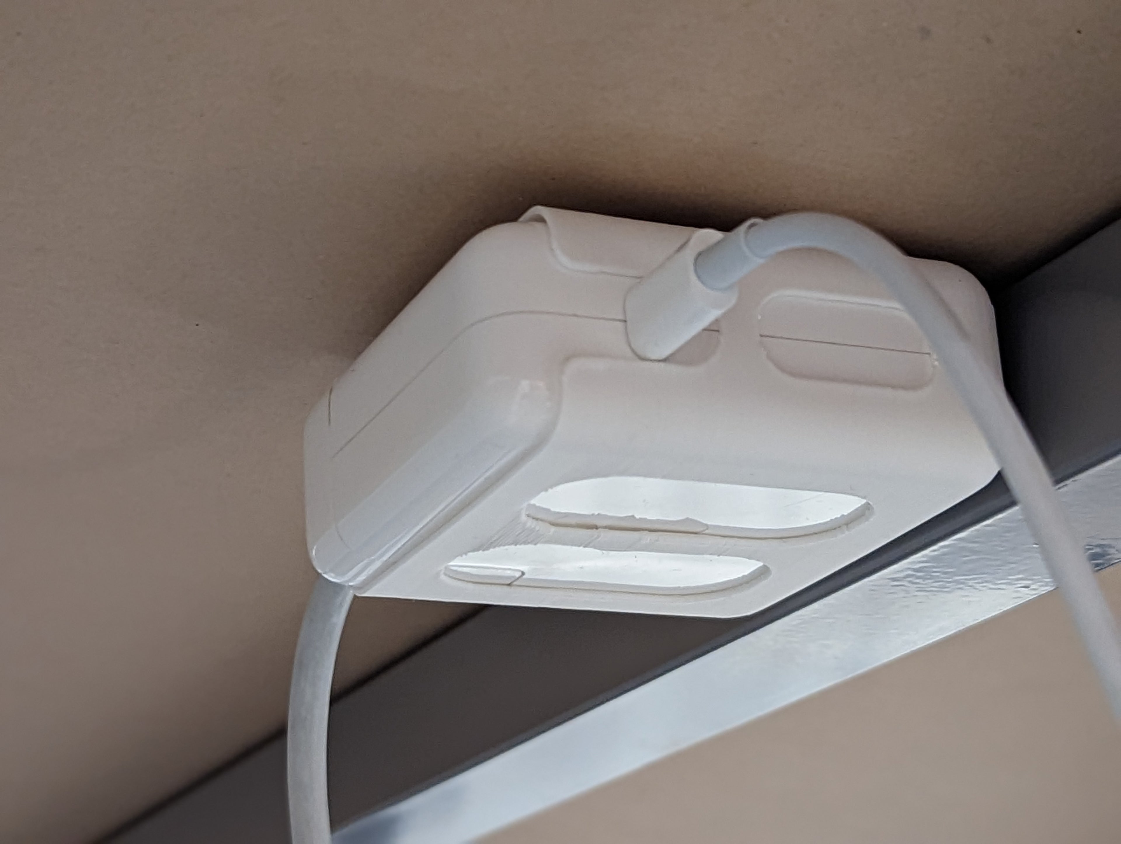 Under desk mount for Apple MacBook Pro 61W power block