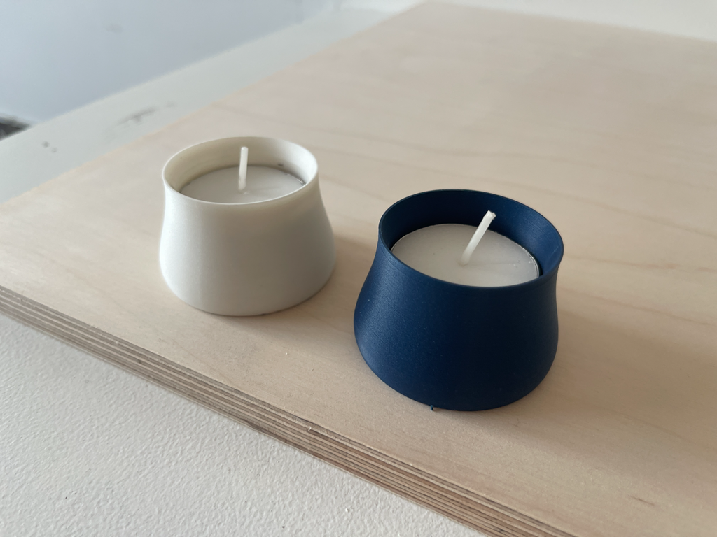 Flaired top tea light candle holder